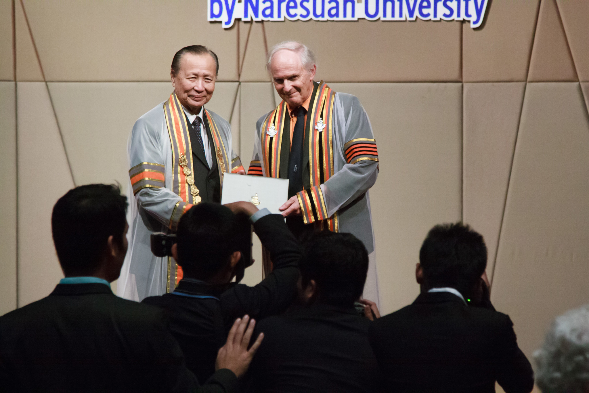 Chemistry Nobel Laureate Prof. Sir Harold W. Kroto being conferred an honorary doctorate degree by Naresuan University in Bangkok