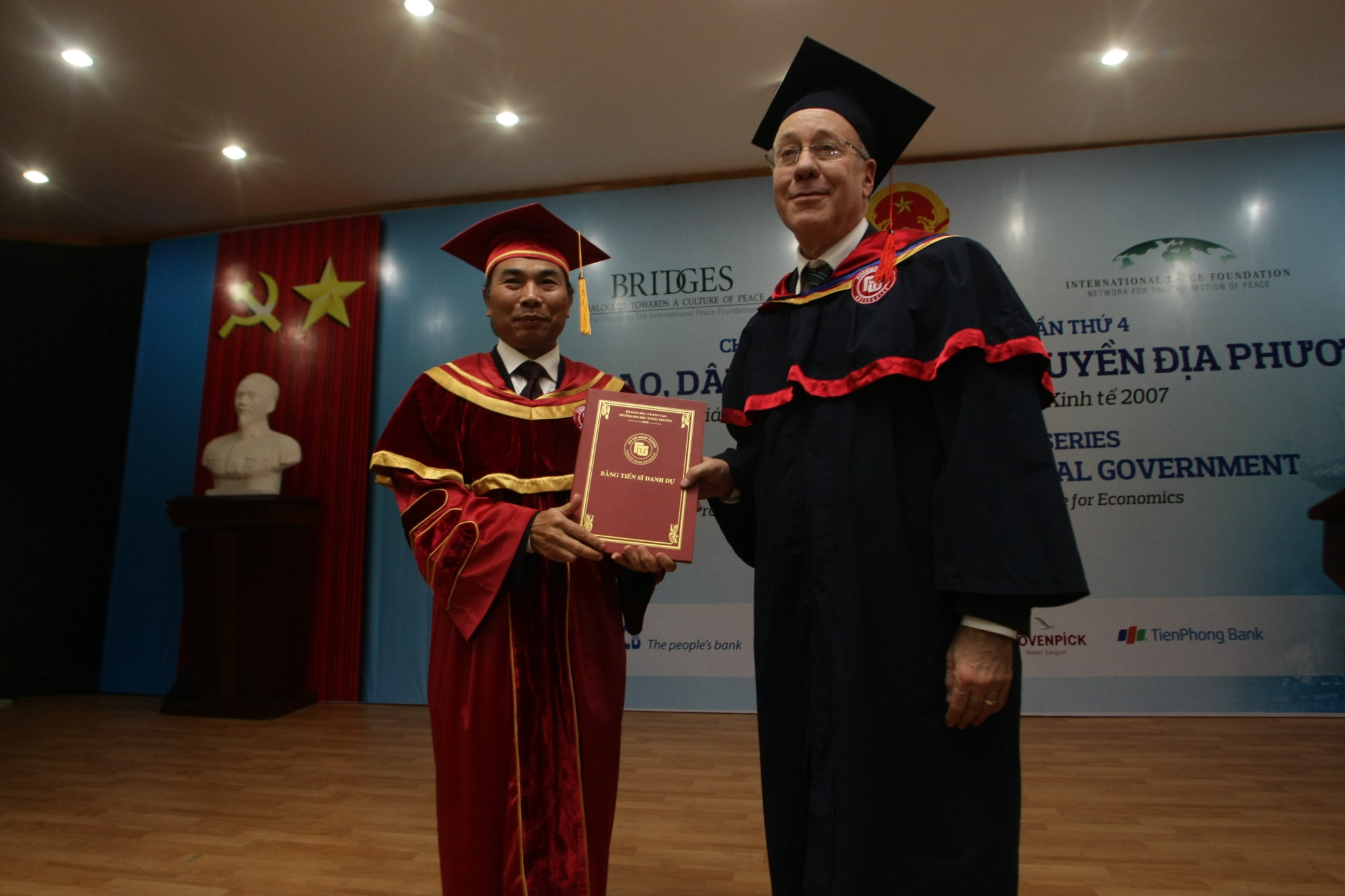 Economics Nobel Laureate Prof. Roger B. Myerson being awarded an honorary doctorate degree in Hanoi